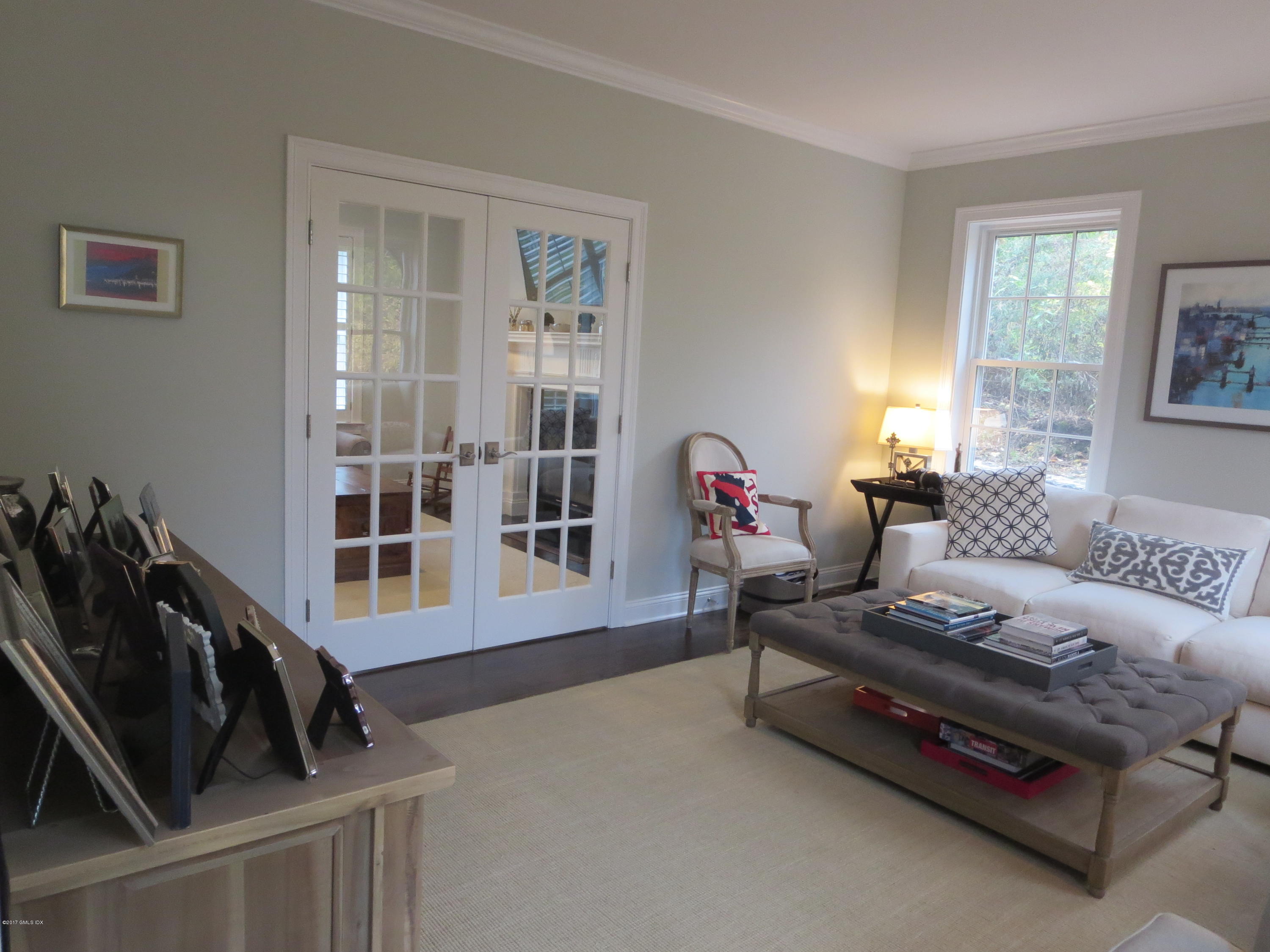 551 River Road Cos Cob, CT 06870 - Photo 6 of 40 a bedroom with furniture and a window