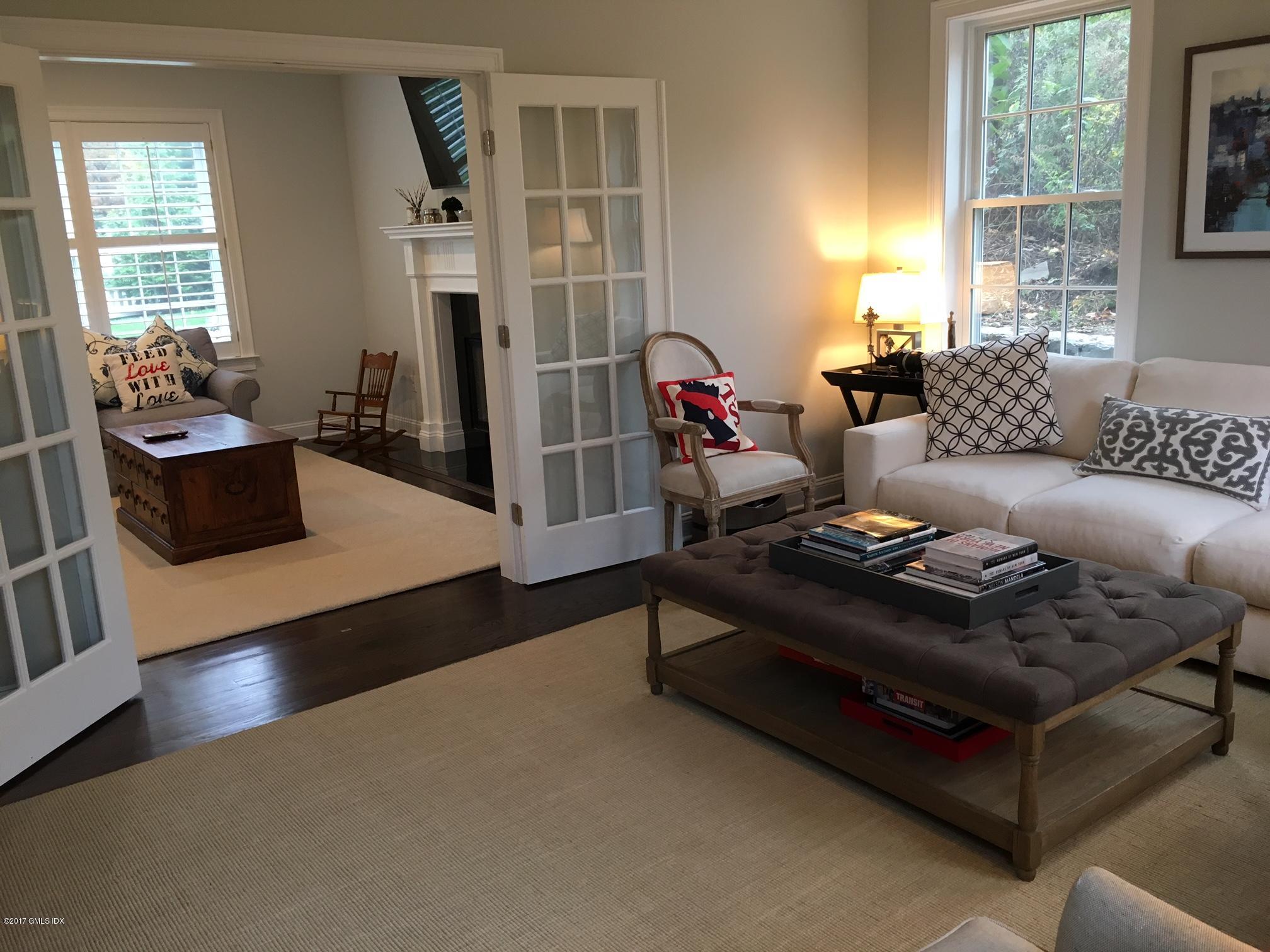551 River Road Cos Cob, CT 06870 - Photo 7 of 40 a living room with furniture and a window
