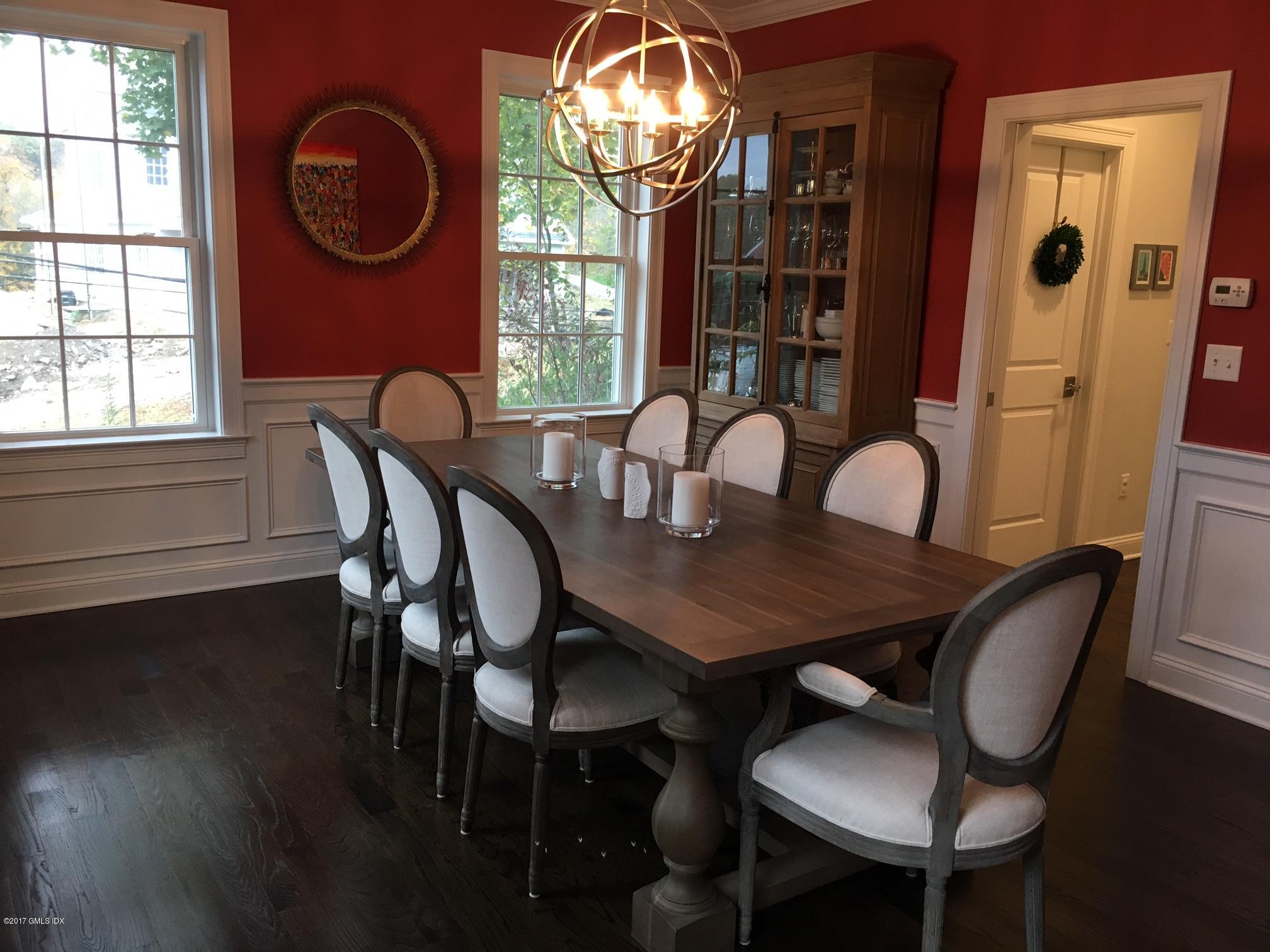 551 River Road Cos Cob, CT 06870 - Photo 8 of 40 a view of a dining room with furniture window and wooden floor