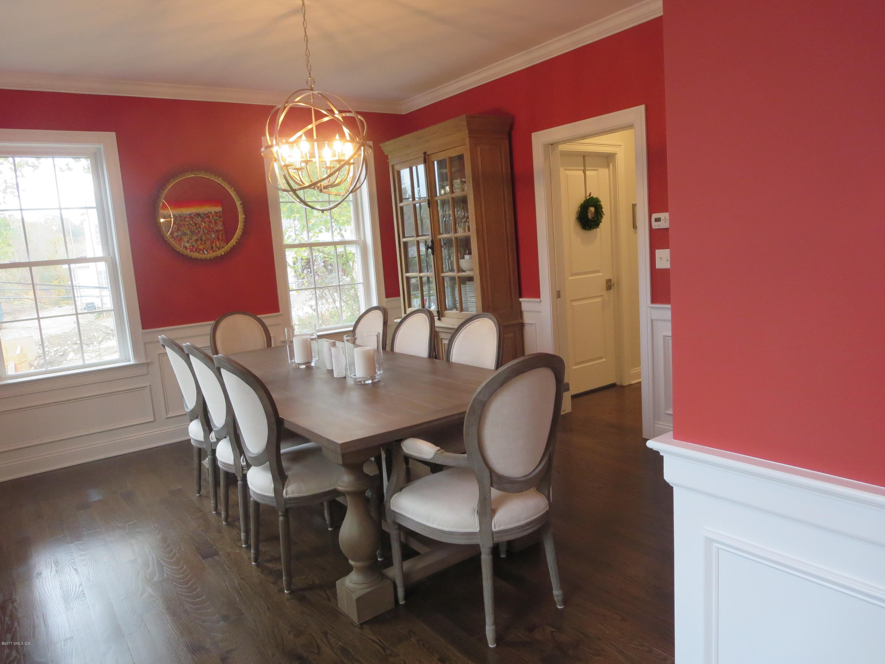 551 River Road Cos Cob, CT 06870 - Photo 9 of 40 a dining room with furniture window and wooden floor