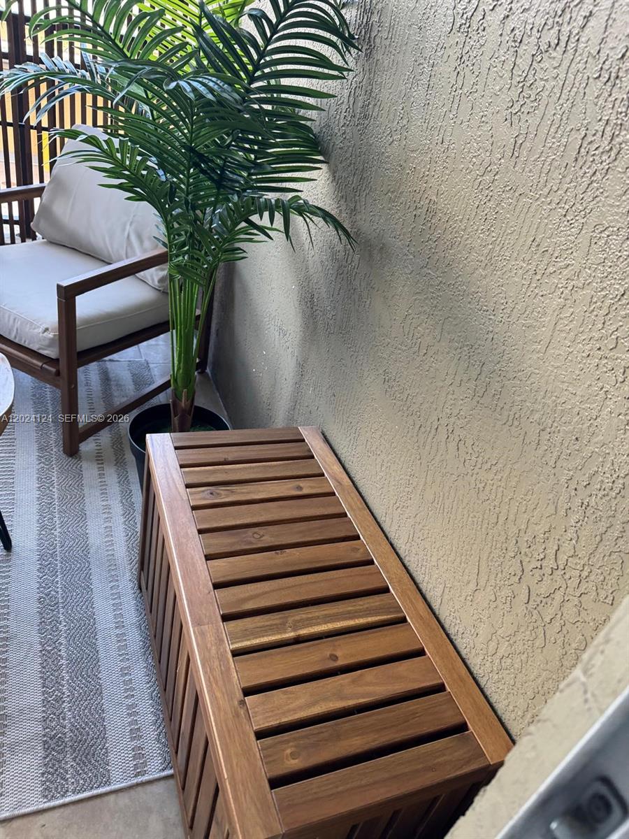 120 South Douglas Road, Unit 302 Miami, FL 33134 - Photo 22 of 28 a view of entryway with wooden floor