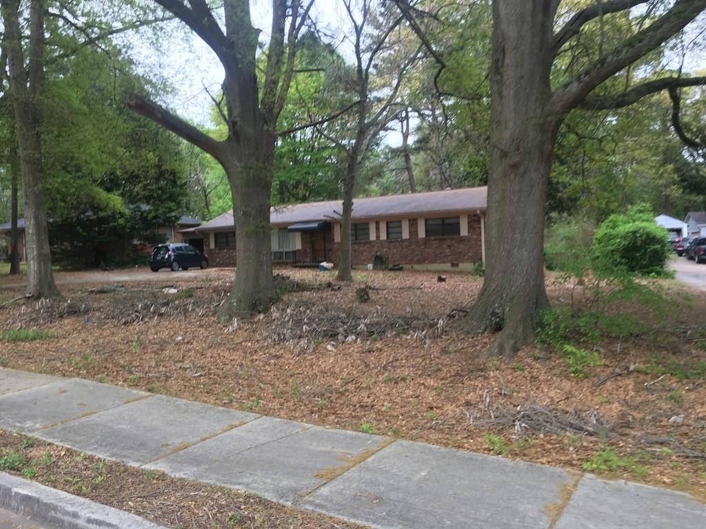 849 Rays Road Stone Mountain, GA 30083 - Photo 1 of 1 Sidewalk, Four Sides Brick, Hardwoods, and .7 Acre on level land.