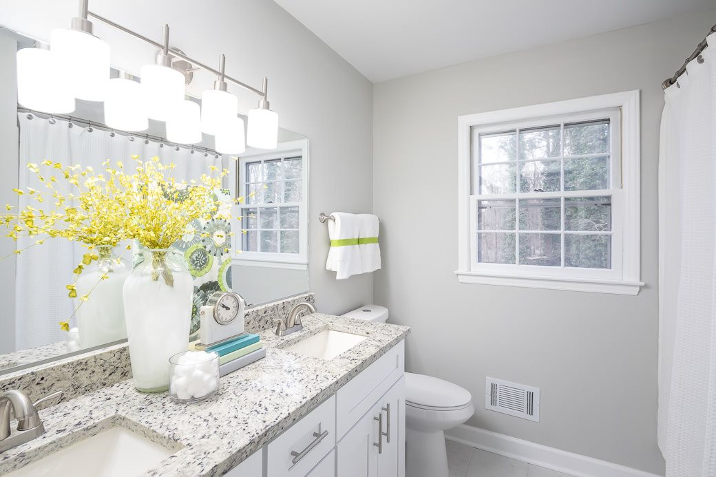 8913 Hunting Trail Raleigh, NC 27613 - Photo 8 of 19 Beautifully updated bathroom has been updated with GRANITE countertops. NEW Fixtures & freshly painted. All the hardware has been changed to BRUSHED NICKEL. Bathroom