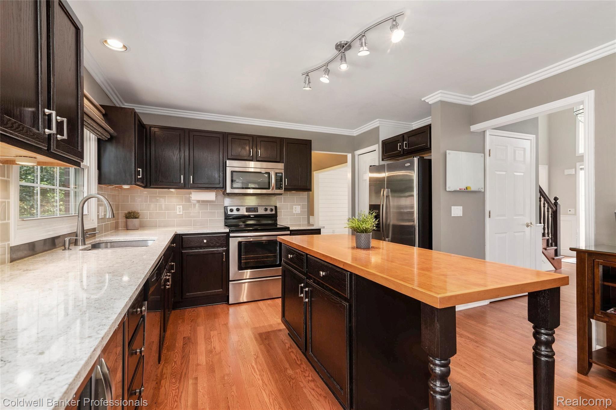 1040 Indianpipe Road Lake Orion, MI 48360 - Photo 4 of 41 Quartz Counters and Huge Center Island