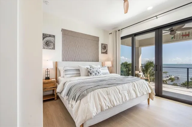 a view of a porch with furniture and front door