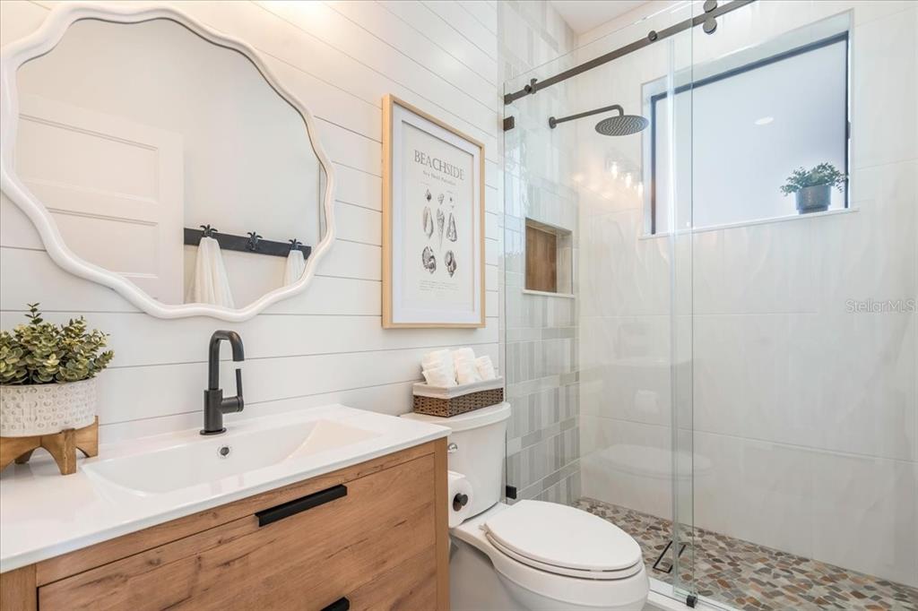 1000 68th Street Marathon, FL 33050 - Photo 47 of 75 a bathroom with a sink toilet and shower