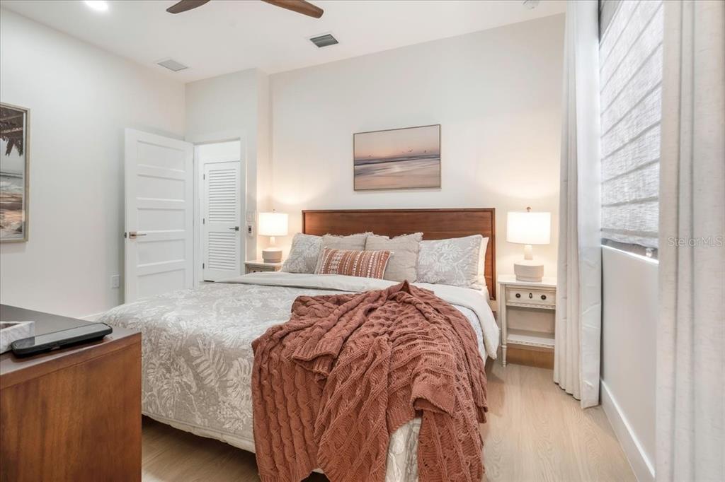 1000 68th Street Marathon, FL 33050 - Photo 60 of 75 a bed room with a bed and a night stand