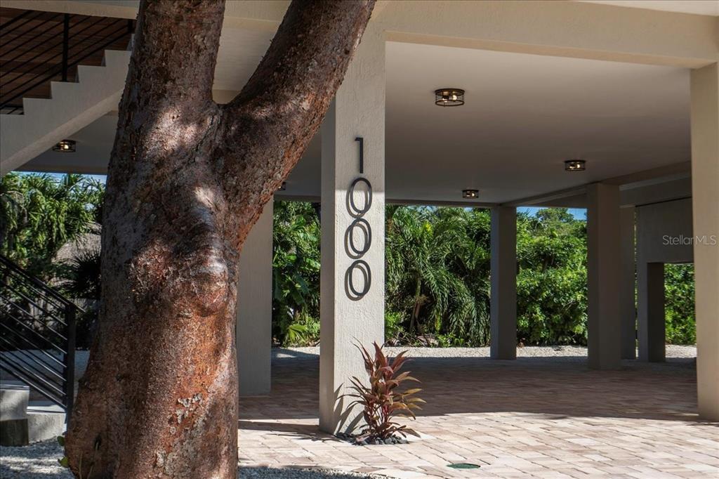 1000 68th Street Marathon, FL 33050 - Photo 9 of 75 a sign that is on the side of the road