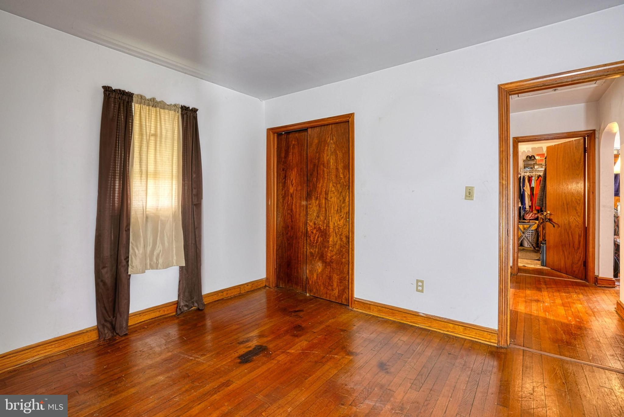 1200 Race Street Cambridge, MD 21613 - Photo 14 of 18 an empty room with wooden floor and closet