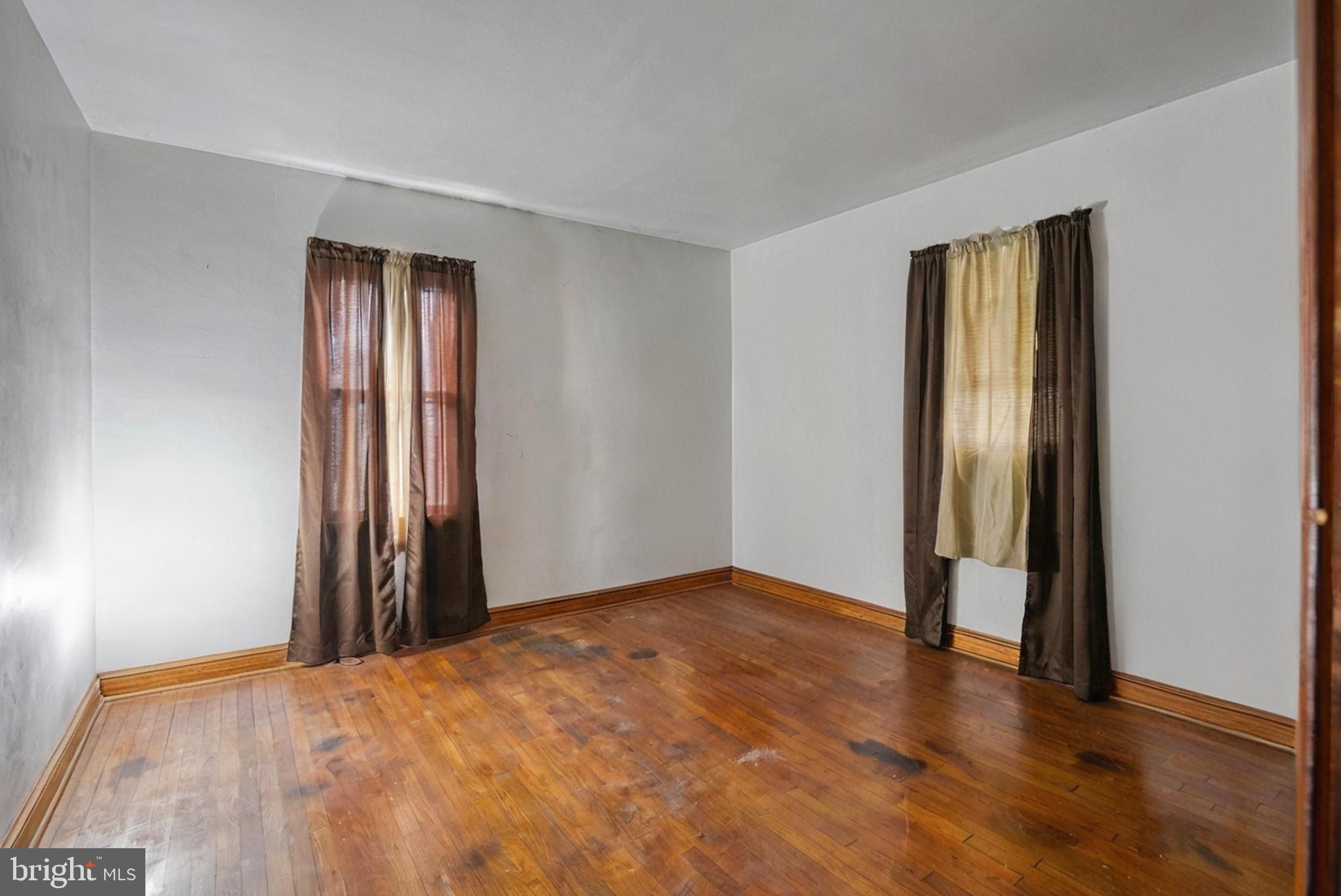1200 Race Street Cambridge, MD 21613 - Photo 15 of 18 a view of a room with wooden floor and closet