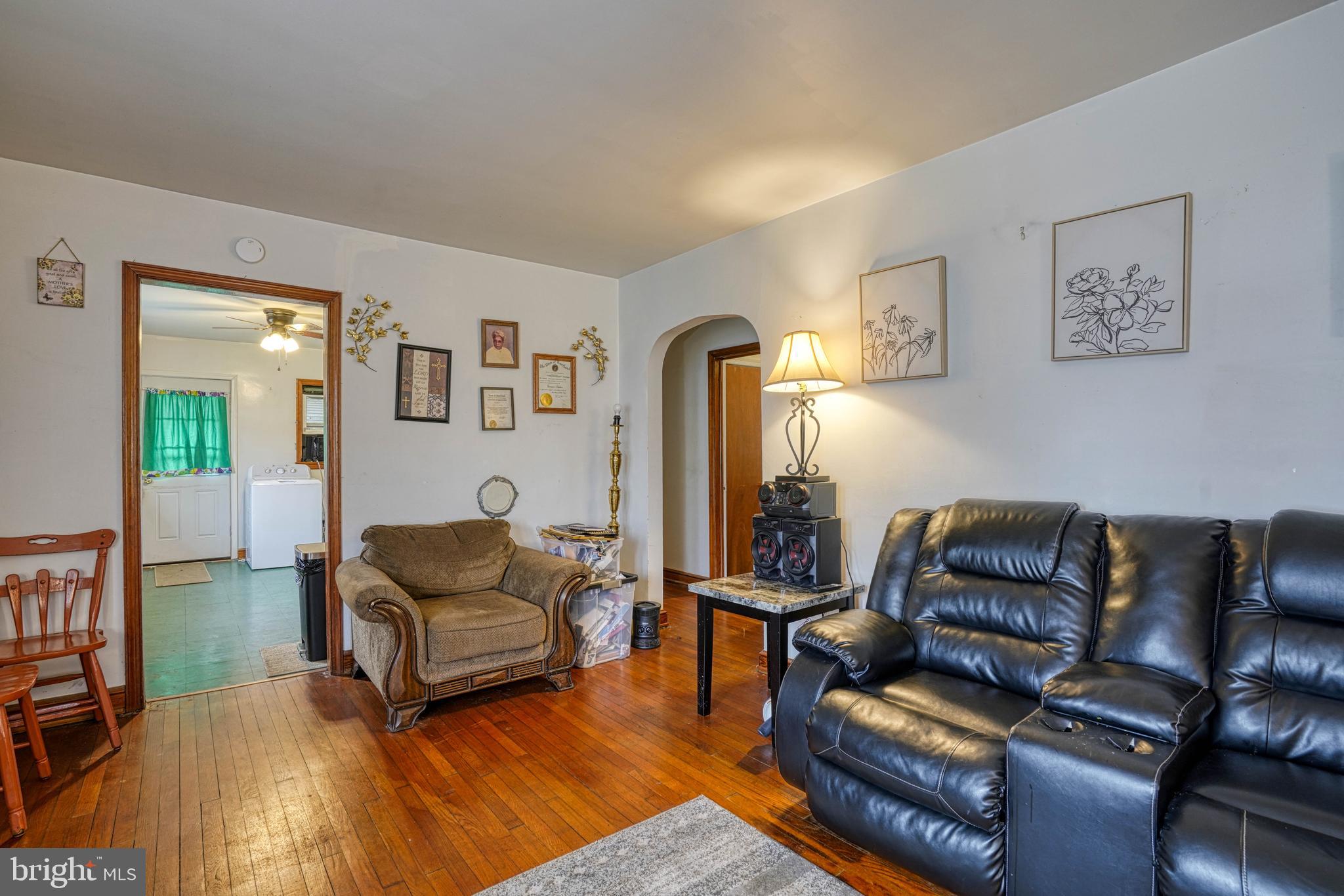1200 Race Street Cambridge, MD 21613 - Photo 7 of 18 a living room with furniture and a wooden floor
