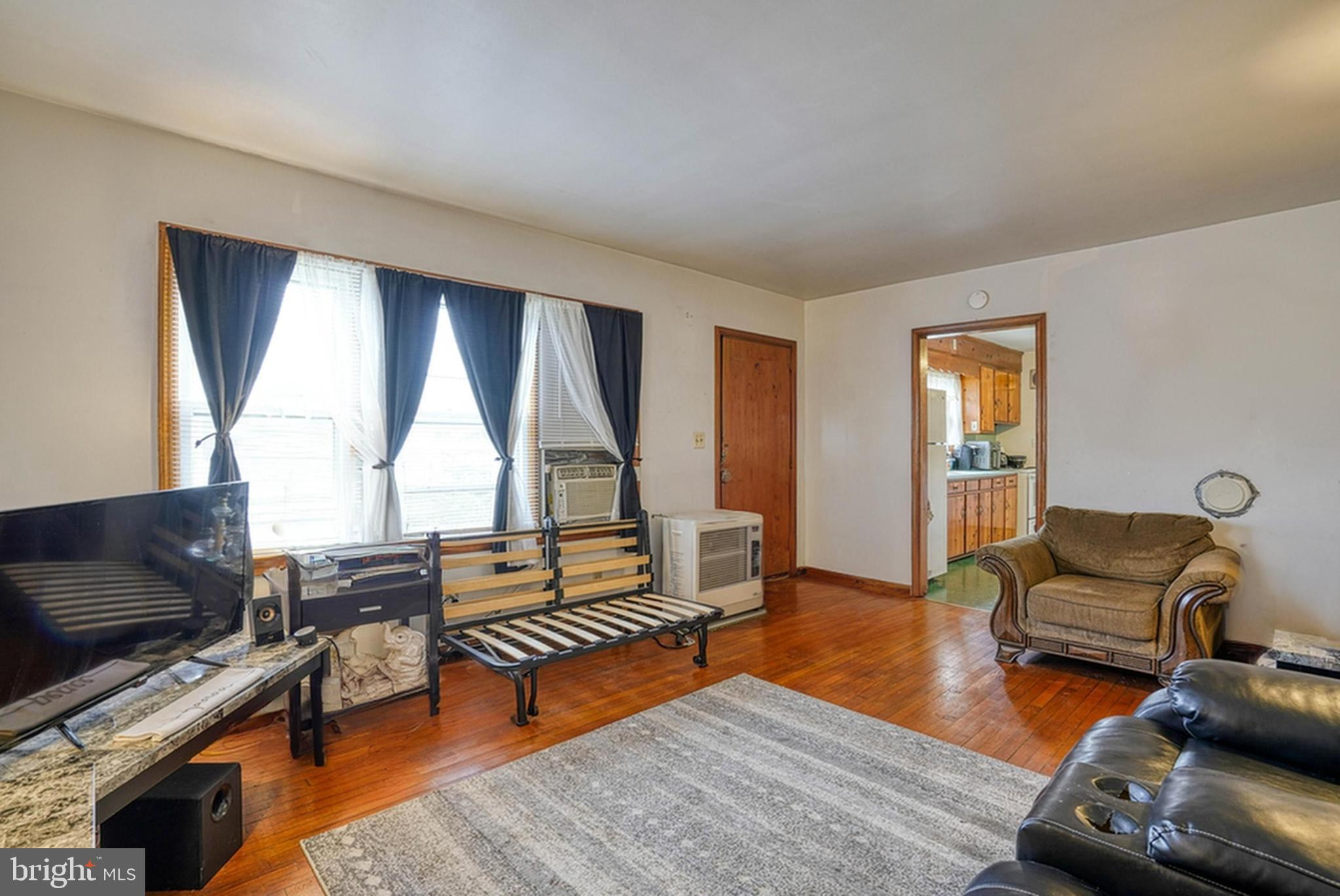 1200 Race Street Cambridge, MD 21613 - Photo 9 of 18 a living room with furniture and a wooden floor