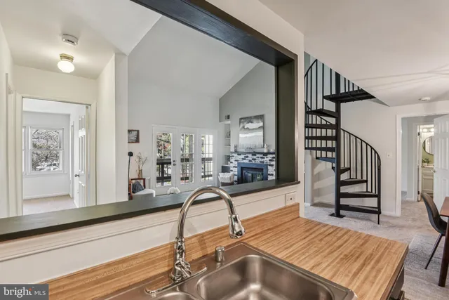 a kitchen with lots of counter top space and appliances