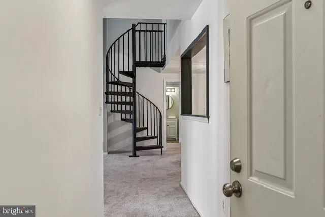 a view of entryway with stairs