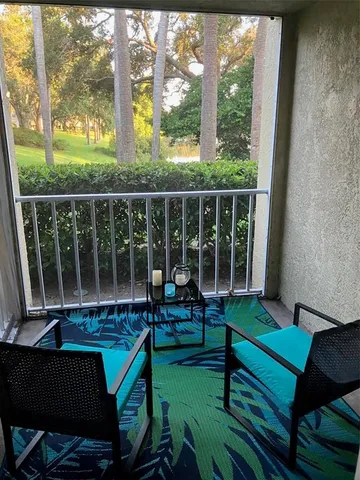 a view of a two chairs in the deck