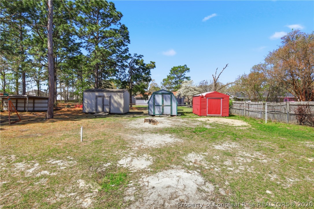 6319 Rustic Ridge Hope Mills, NC 28348 - Photo 38 of 39 a house view with a backyard space