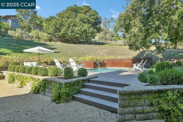 a view of a tables and chairs in the patio