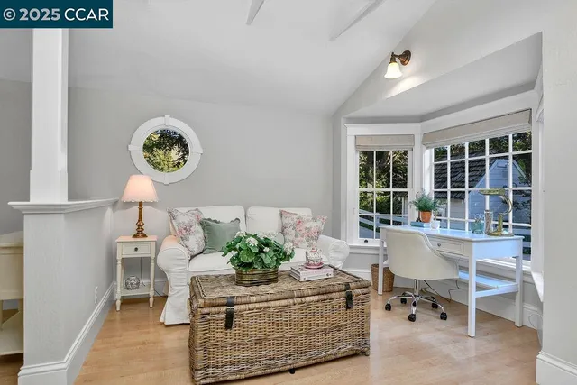 a view of a park with large trees