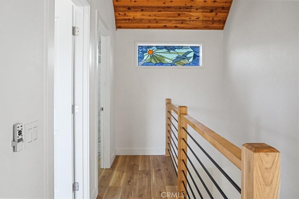 59470 Burnt Valley Road Anza, CA 92539 - Photo 13 of 18 a view of a hallway with wooden floor