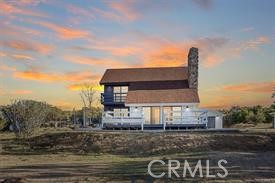 59470 Burnt Valley Road Anza, CA 92539 - Photo 18 of 18 a view of a house with a yard