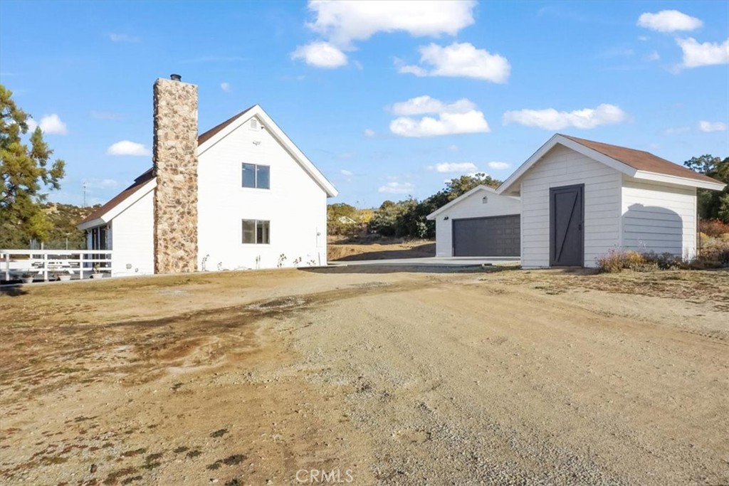 59470 Burnt Valley Road Anza, CA 92539 - Photo 2 of 18 a view of a house with a snow on the road