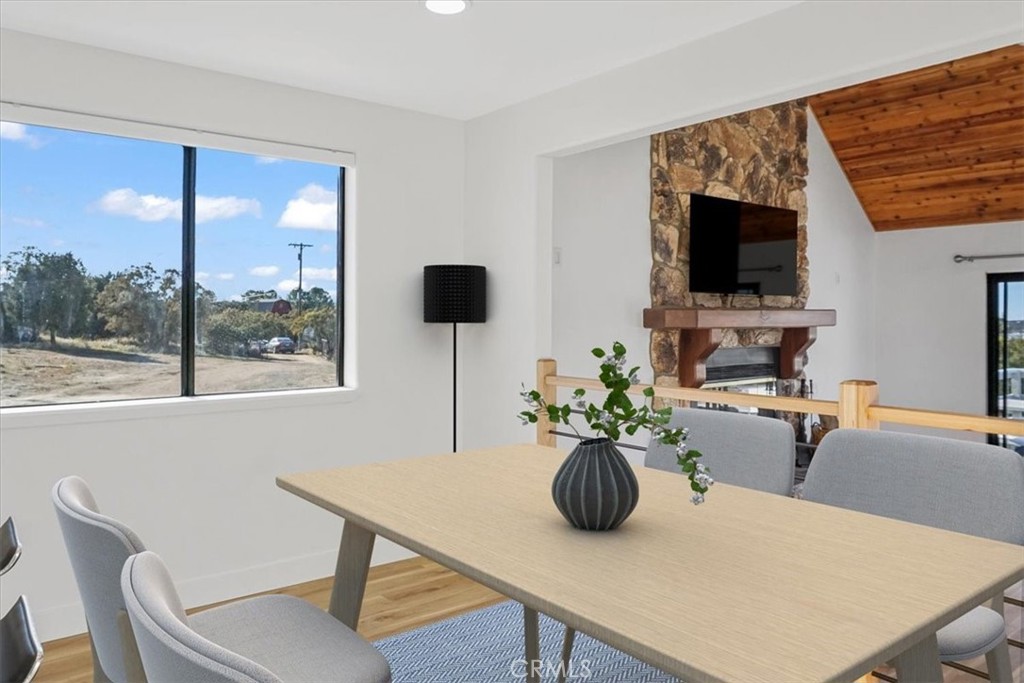 59470 Burnt Valley Road Anza, CA 92539 - Photo 7 of 18 a view of a dining room with furniture window and outside view