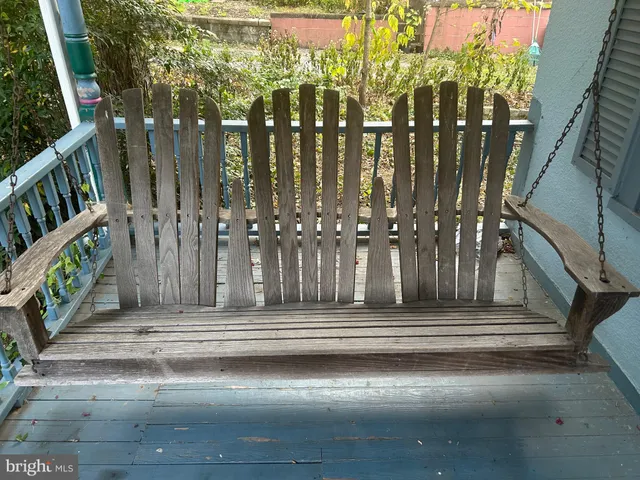 a view of hall with wooden floor and outdoor space