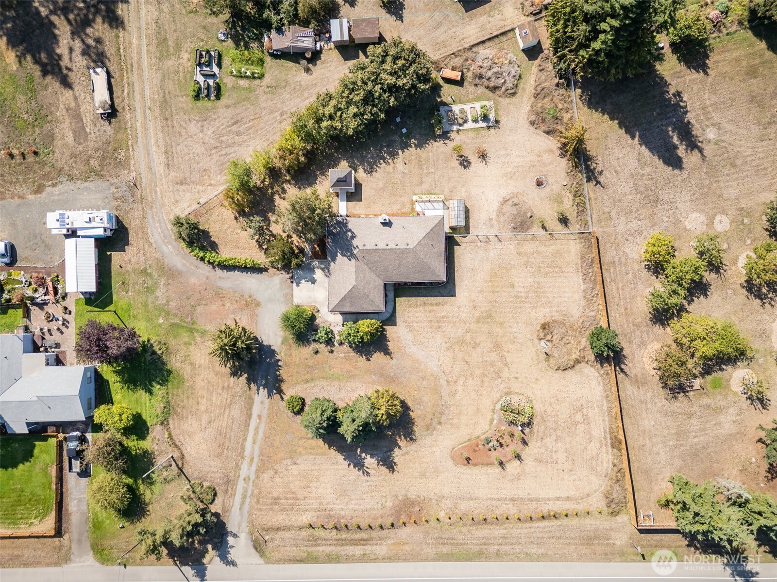 92 Robbins Road Sequim, WA 98382 - Photo 38 of 39 an aerial view of a house with a yard