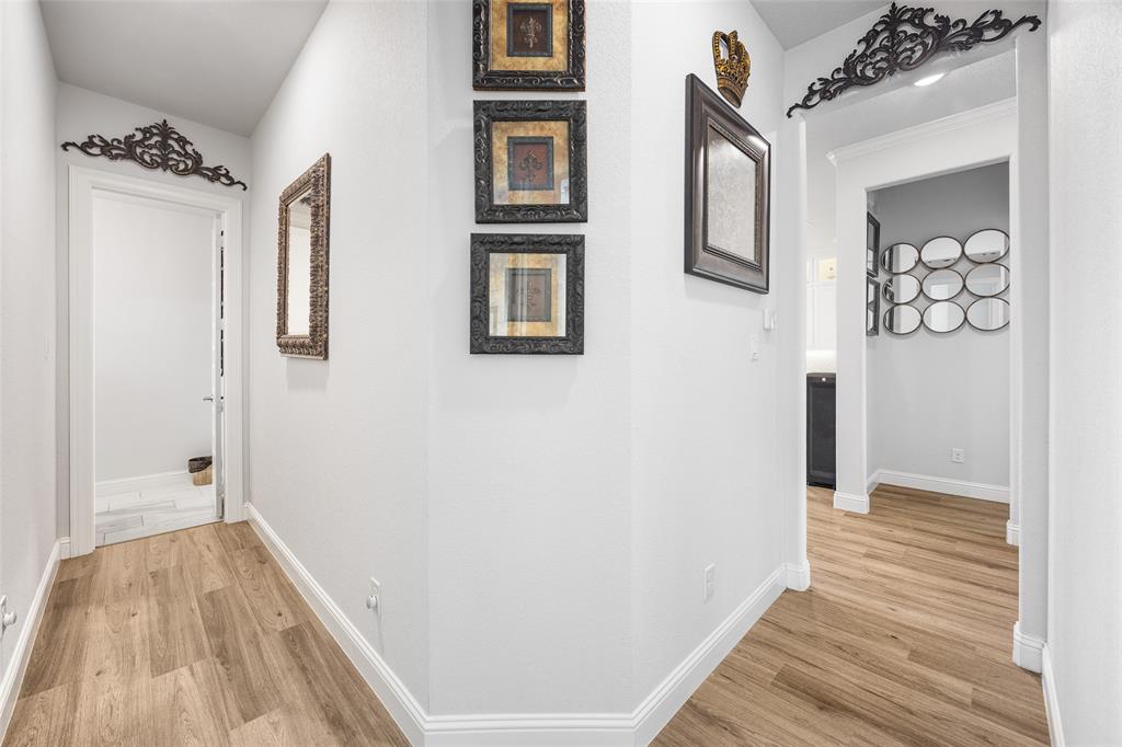 2628 Flycatcher Road Fort Worth, TX 76118 - Photo 28 of 38 Corridor with light wood-style flooring and baseboards