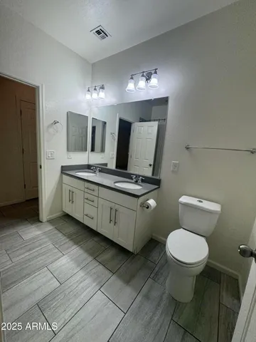 an empty room with a empty space and windows