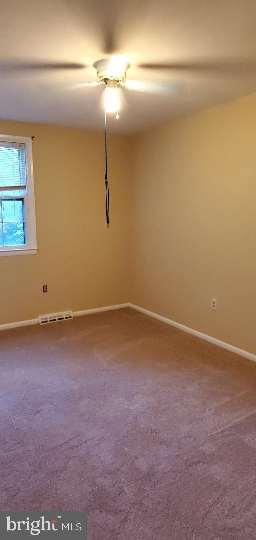 8512 Imperial Drive, Unit 1H Laurel, MD 20708 - Photo 5 of 14 a view of a room with an empty space