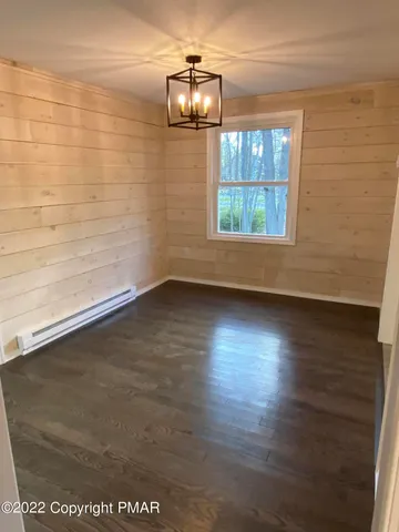 a view of livingroom with hardwood floor and window