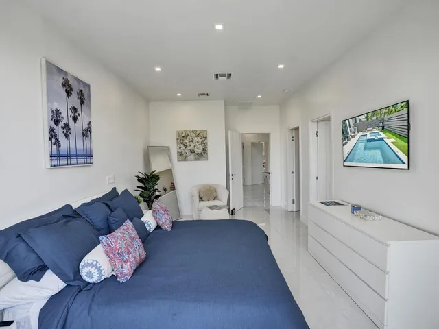 a bathroom with a double vanity sink mirror and double