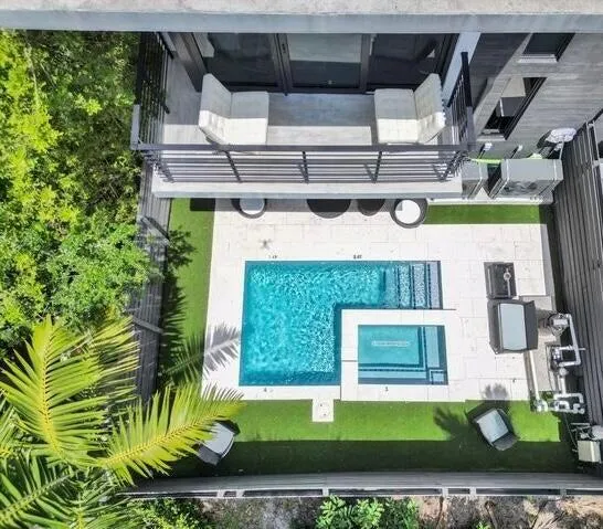 a view of outdoor kitchen and patio