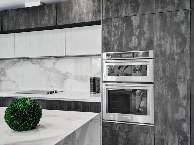 a kitchen with a stove and a microwave