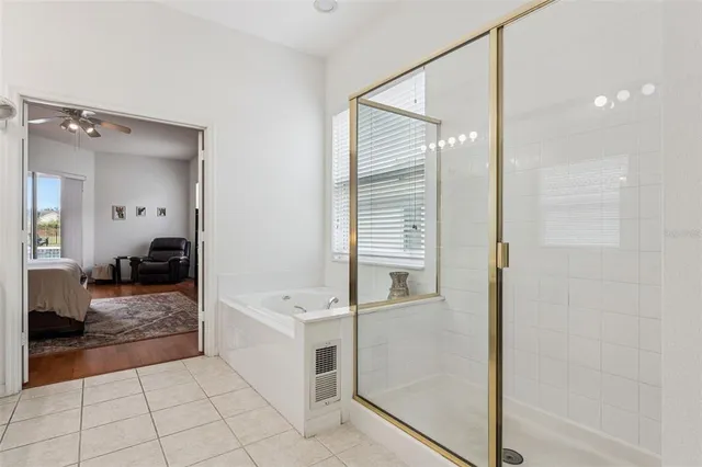 a bed room with furniture and a wooden floor