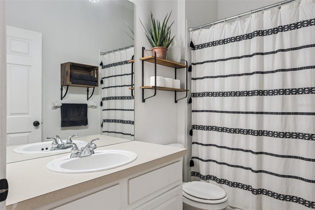 11162 Ledgement Lane Windermere, FL 34786 - Photo 27 of 55 a bathroom with a sink toilet and shower