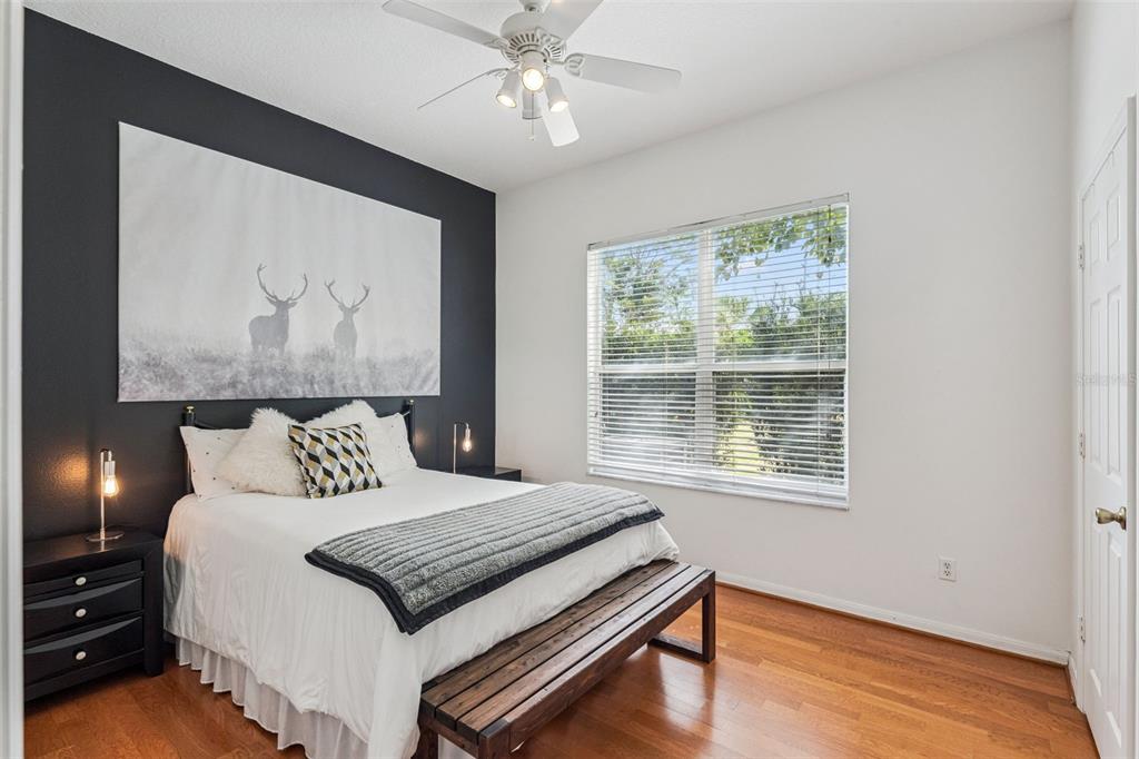 11162 Ledgement Lane Windermere, FL 34786 - Photo 28 of 55 a bedroom with a bed dresser and a window