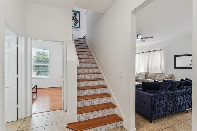 a living room with furniture and rug