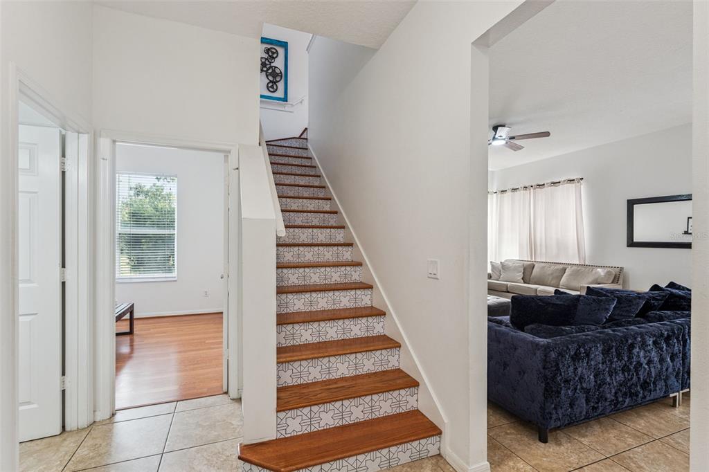 11162 Ledgement Lane Windermere, FL 34786 - Photo 30 of 55 a living room with furniture and a rug