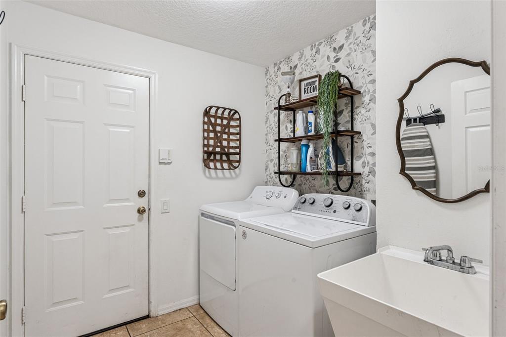 11162 Ledgement Lane Windermere, FL 34786 - Photo 35 of 55 a bathroom with a sink and a mirror