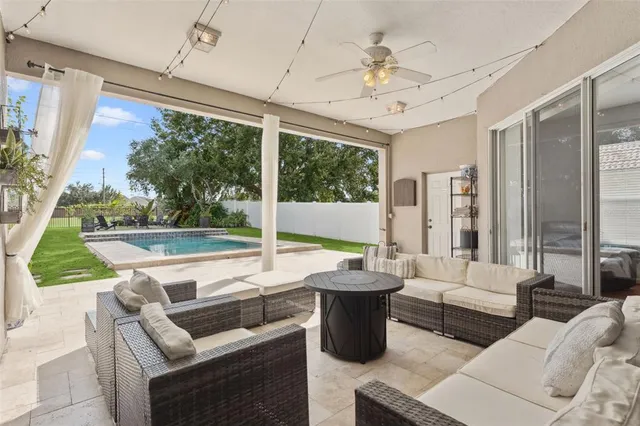 a view of a swimming pool with a yard