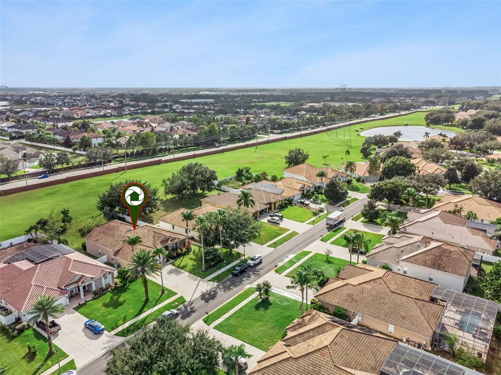 11162 Ledgement Lane Windermere, FL 34786 - Photo 45 of 55 an aerial view of a residential houses with outdoor space and swimming pool