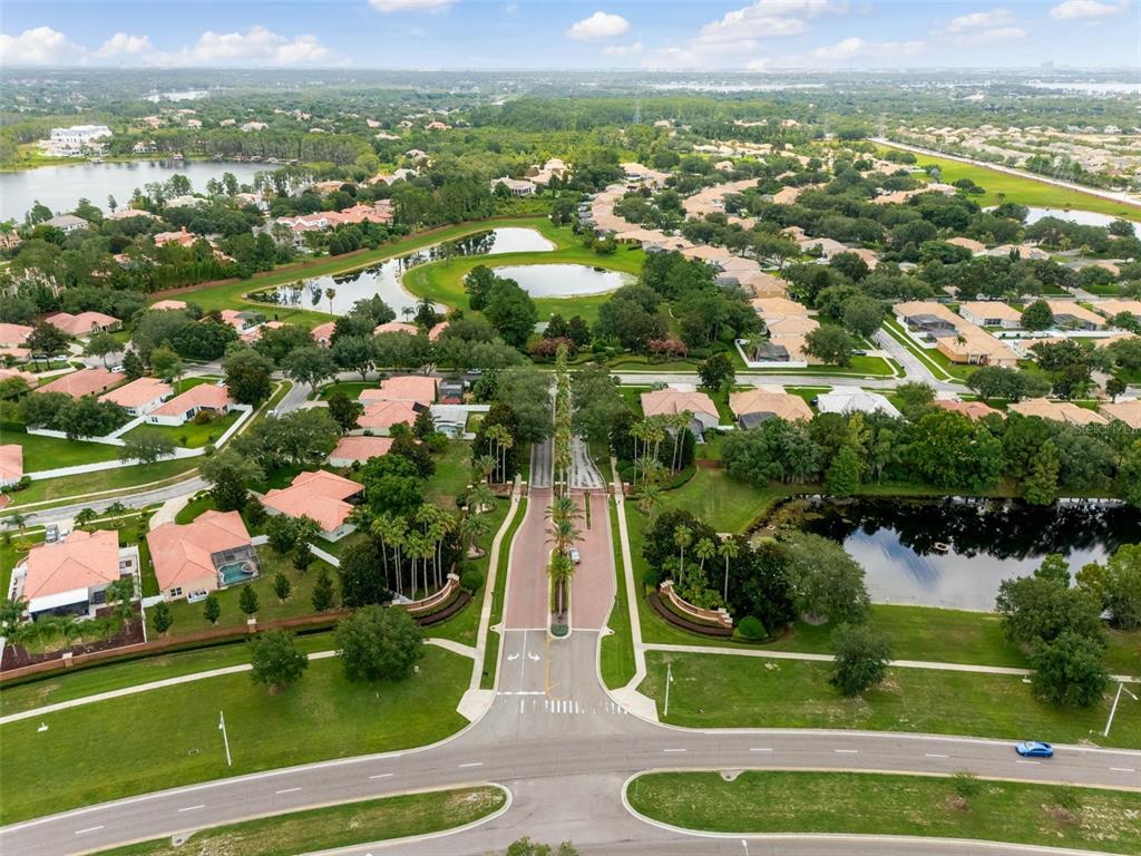 11162 Ledgement Lane Windermere, FL 34786 - Photo 52 of 55 an aerial view of residential houses with outdoor space and swimming pool