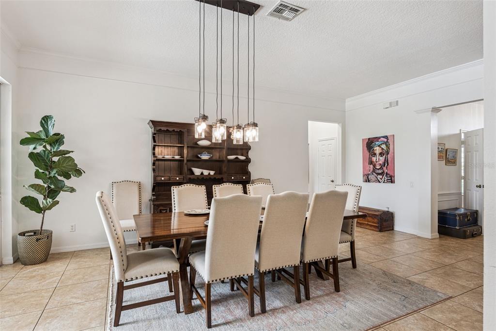 11162 Ledgement Lane Windermere, FL 34786 - Photo 10 of 55 a view of a dining room with furniture and chandelier