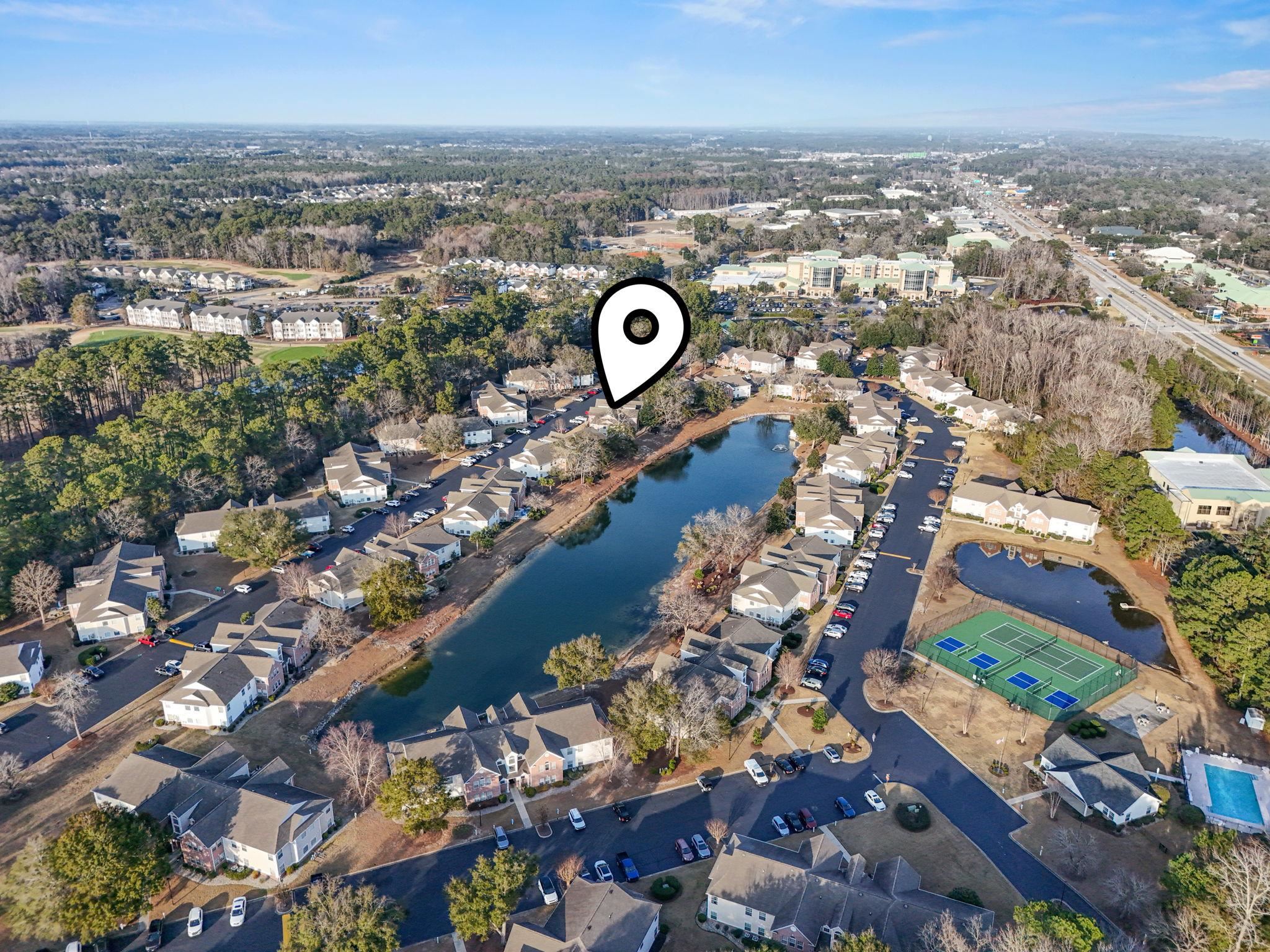 4383 Daphne Lane, Unit F Murrells Inlet, SC 29576 - Photo 3 of 35 Aerial overview of property's location featuring a nearby body of water and nearby suburban area
