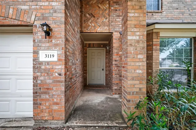 a view of a brick wall of the building