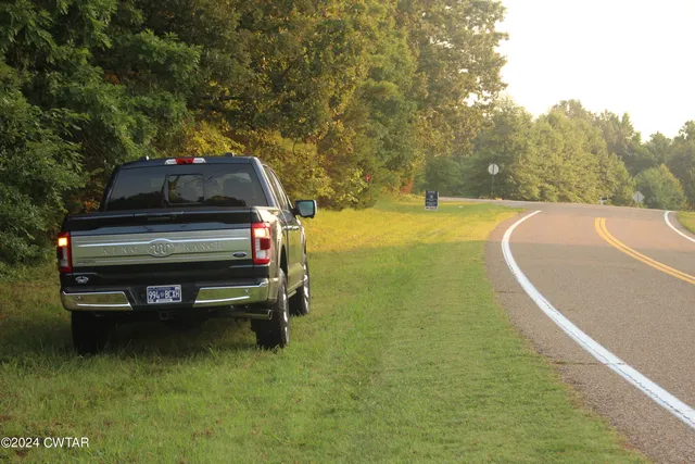 a view of a lake with outdoor space