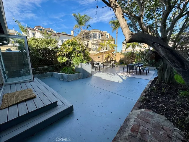 swimming pool view with a garden space