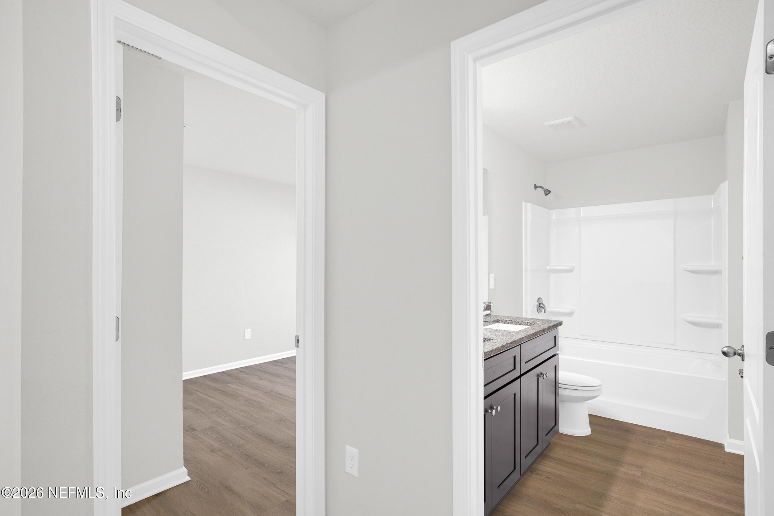 138 Kelly Smith School Road Palatka, FL 32177 - Photo 25 of 52 a view of a hallway with wooden floor